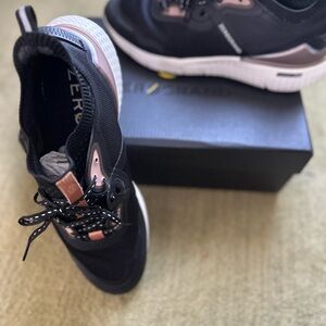 Cole Haan Zero Grand women’s sneakers.  Black w tan